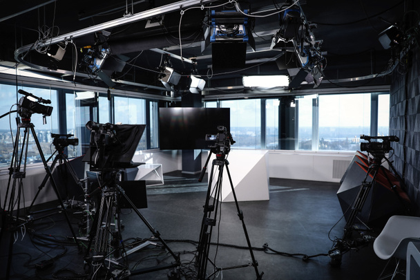 Modern video recording studio with professional cameras - Photo, Image