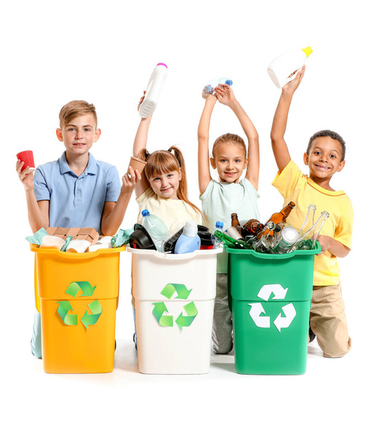 Little children and containers with trash on white background. Concept of recycling - Foto, Imagen
