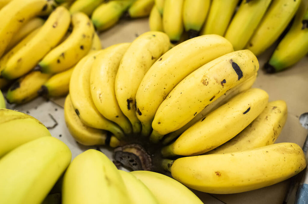 banana fruit stacked on the marketplace - Zdjęcie, obraz