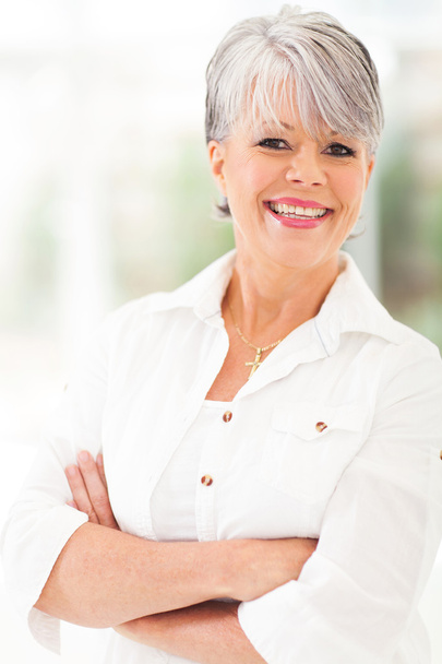 middle aged woman with arms folded - Photo, Image