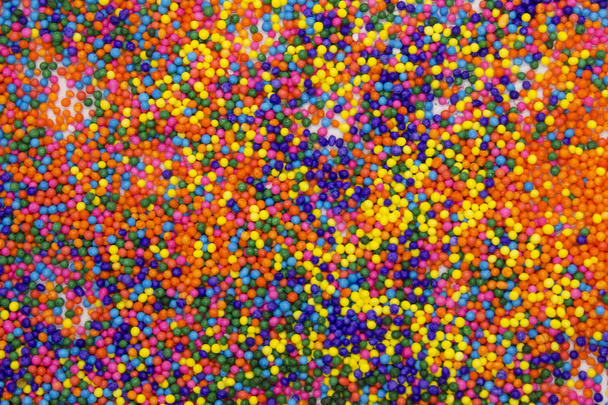 Tämä on tausta värikäs neon värillinen pyöreä sprinkles tausta
 - Valokuva, kuva