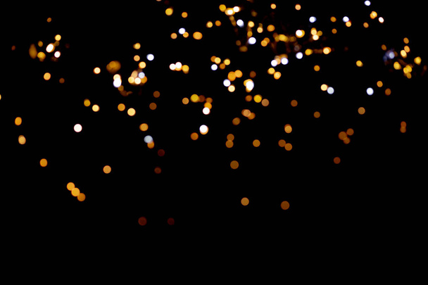 glitter lights on black background - Photo, Image