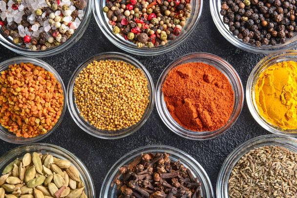 Bowls with many different spices on table - Photo, Image