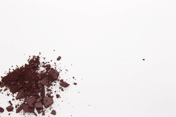 This is a photograph of a Matte Dark Purple Powder Eyeshadow isolated on a White Background  - Φωτογραφία, εικόνα