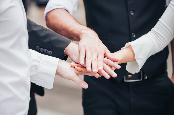 Business people join hand together for unity teamwork or partner concept. - 写真・画像