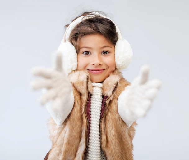 Happy littl girl in winter clothes - Photo, Image