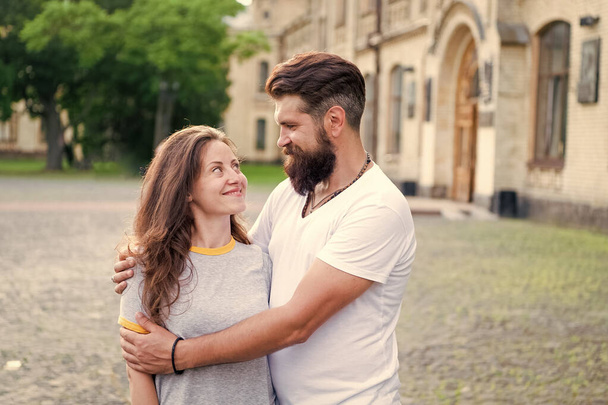 Couple in love walking having fun. Couple relaxing enjoying each other. Man bearded hipster and pretty woman in love. Loving heart is truest wisdom. Summer vacation. Fall in love. Happy together - Photo, Image