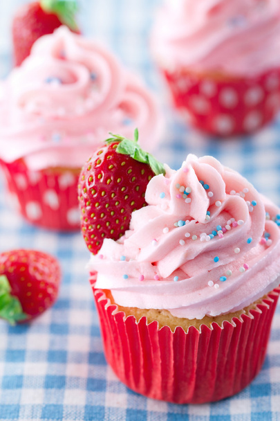 Strawberry cupcakes on vintage blue towel - Photo, Image