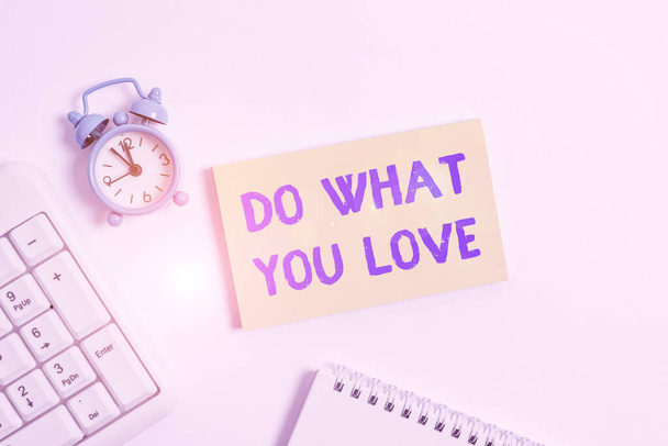 Conceptual hand writing showing Do What You Love. Business photo text Make enjoyable things do activities with motivation Keyboard with empty note paper and pencil white background. - Fotografie, Obrázek