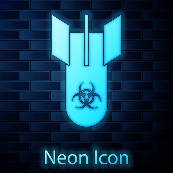 Gloeiende neon Biohazard bom icoon geïsoleerd op bakstenen muur achtergrond. De raketbom vliegt naar beneden. Vector Illustratie - Vector, afbeelding