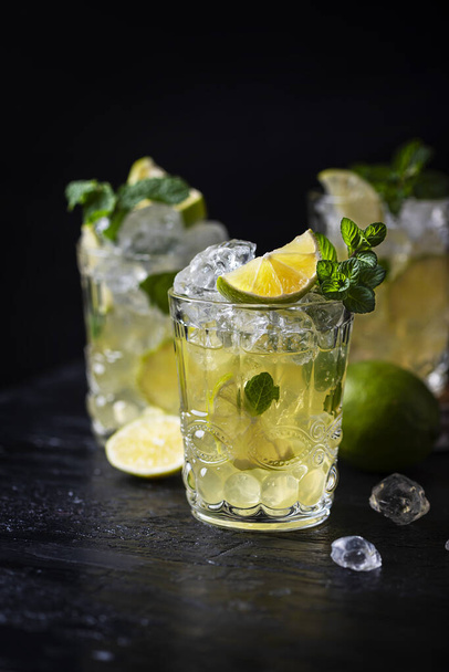 Cold tea with ice, mint and lime  - Photo, Image