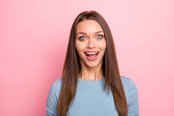 Photo of cheerful positive crazy overjoyed girl rejoicing in sales started in shopping mall nearby isolated pink pastel color background - Fotografie, Obrázek