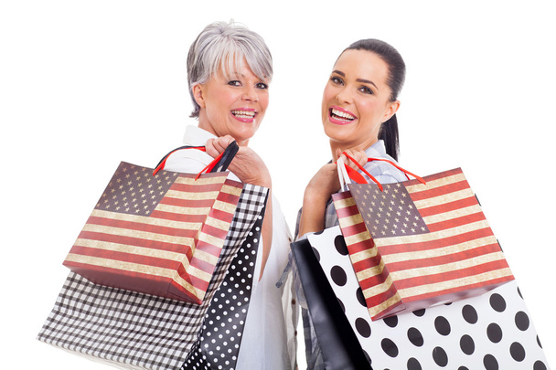 middle aged woman with her daughter shopping - Foto, Imagen