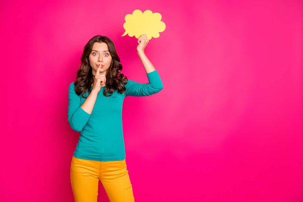 Copyspace photo of trendy curly wavy girlfriend showing you shh sign to stop discussing ger thoughts in yellow bubble isolated pink vivid color background - Fotografie, Obrázek