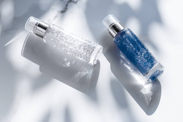 Skin care serum and gel bottle, moisturizing lotion and lifting  - Фото, изображение