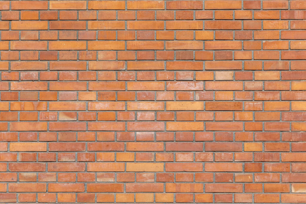Ameri 'de kırmızı alçı taşlı tuğla duvarın harmonik arka planı - Fotoğraf, Görsel