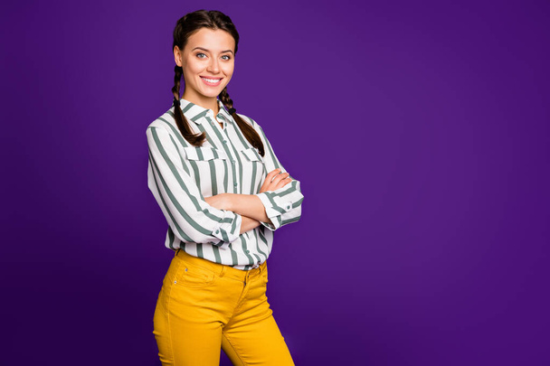 Profile photo of beautiful business lady holding hands crossed reliable responsible person wear striped shirt yellow trousers isolated purple color background - Φωτογραφία, εικόνα