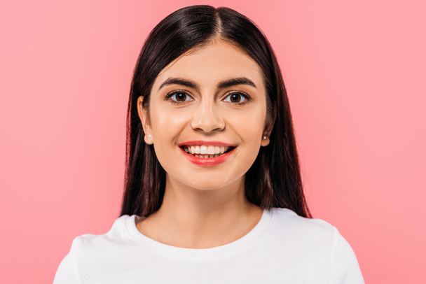 portrait of smiling pretty brunette girl isolated on pink - Photo, Image