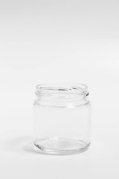 Glass jar for filling on a white background - Photo, Image