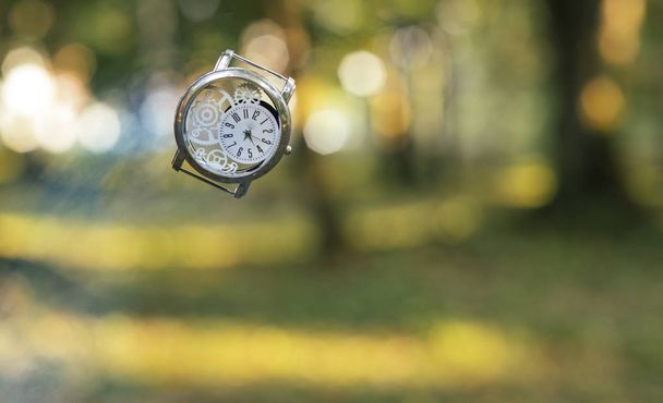 dead line concept time ending photography hand clock on air with motion graphic design effect on blurred unfocused bokeh colorful outdoor background space for copy or text  - Photo, Image