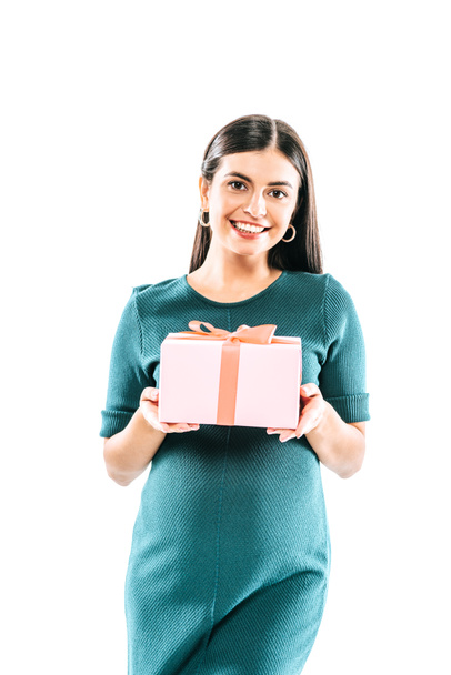 smiling pregnant girl holding present isolated on white - Foto, Imagen