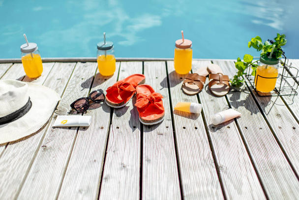 Poolside with accessories for summer vacations - Foto, Imagem
