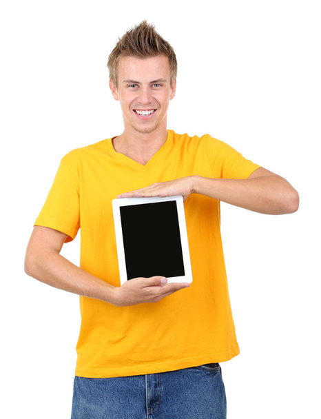 A handsome young man with tablet isolated on white - Valokuva, kuva