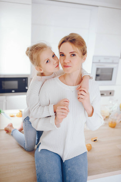 mother with cute blond daughter - Φωτογραφία, εικόνα