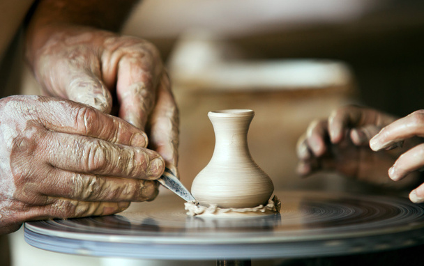 Closeup image ceramist man hands - Foto, Imagen