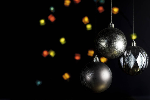 Üç noel balosu ve odaklanmamış Noel ışıkları  - Fotoğraf, Görsel