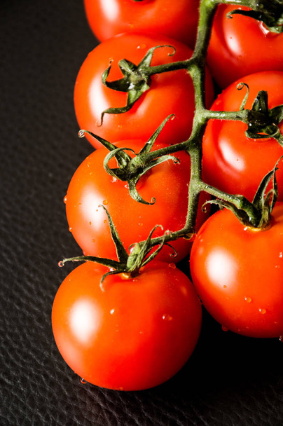 fresh tomatoes on black background - Photo, Image