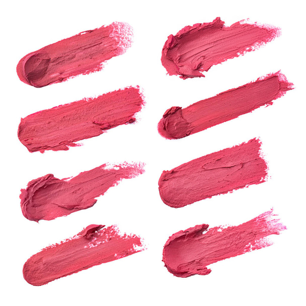 Set lippenstift vlekken geïsoleerd op witte achtergrond - Foto, afbeelding