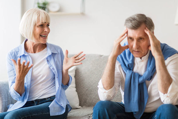 Couple arguing. Senior spouses quarrelling at home - Photo, image