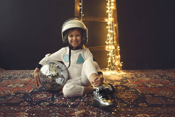 Astronaut futuristic kid girl with white full length uniform and - Photo, Image