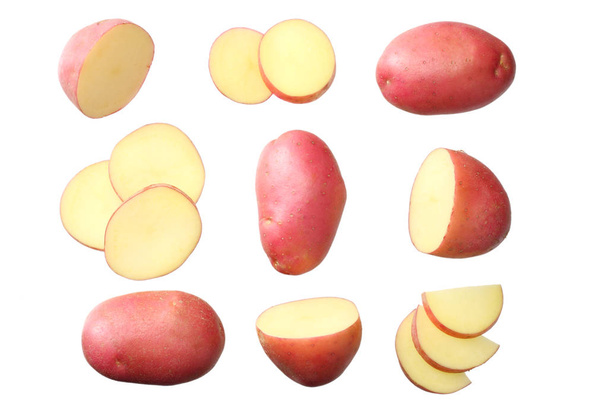 Raw red potato with slices isolated on white background. top view  - Φωτογραφία, εικόνα