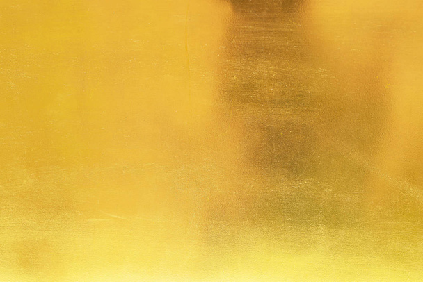 Zlaté abstraktní pozadí nebo textura a přechody stín - Fotografie, Obrázek