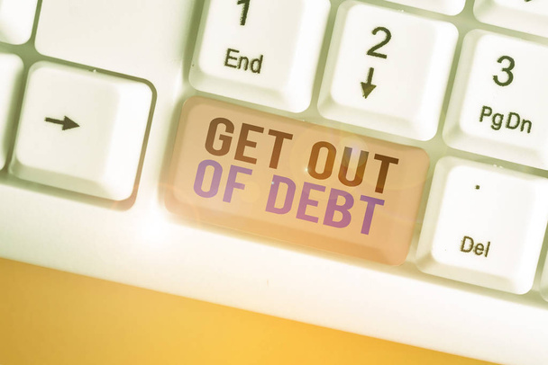 A kézírás szöveg írása Get Out Of adósság. Koncepció, azaz nincs kilátás a kifizetett minden további és adósság mentes. - Fotó, kép