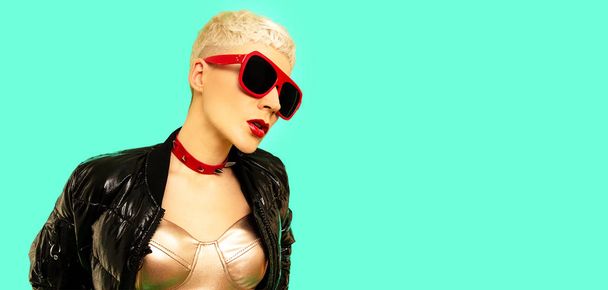 Stylish blonde in fashion accessory sunglasses and choker - Фото, изображение