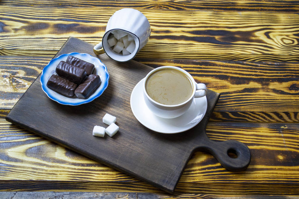 coffee with milk with cookies on a wooden background, top view - Фото, зображення