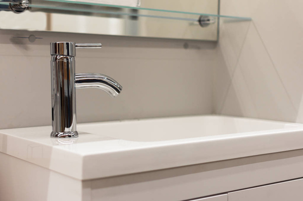 Modern chrome bathroom faucet. Bathroom water tap. Luxury bathroom interior. - Photo, Image