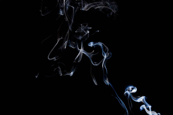 Smoke  on a black background, abstract photo with swirls in the air - Fotografie, Obrázek