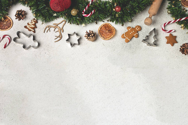 Christmas composition flat lay, tinsel, gingerbread, cookie cutt - Фото, зображення