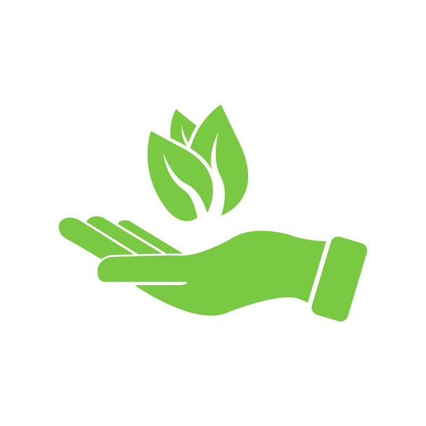 Ręka z zielonymi listkami. Symbol ochrony środowiska. Produkt przyjazny dla środowiska. Wektor Eps 10 - Wektor, obraz
