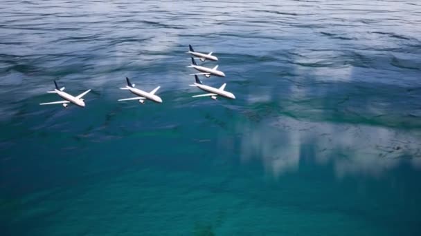 Vijf vliegtuigen vliegen strikt in een bepaalde volgorde boven het oppervlak van een kalme oceaan tegen een wolkenloze lucht. Jamb van vliegtuigen. - Video