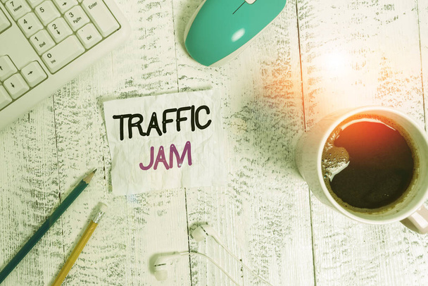 Handwriting text writing Traffic Jam. Concept meaning a large number of vehicles close together and unable to move technological devices colored reminder paper office supplies keyboard mouse. - Photo, Image