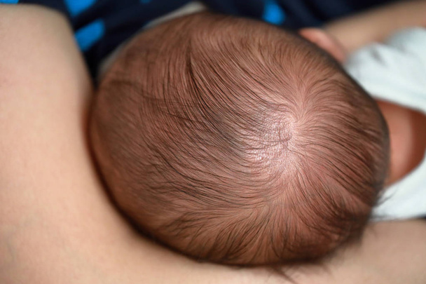 El pelo de cerca del bebé
. - Foto, imagen