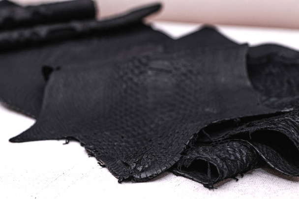 Real black snakeskin python leather. - Foto, afbeelding