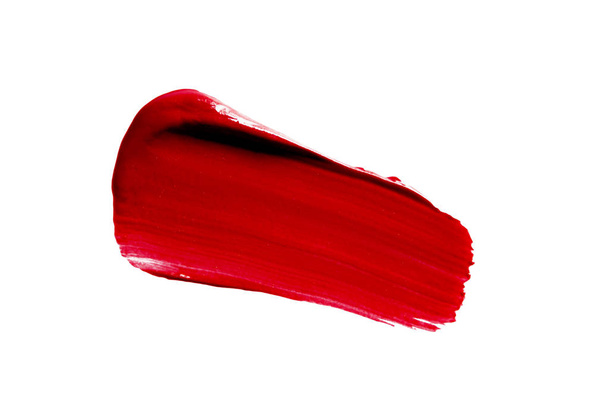 Lippenstift-Schmierabstrich isoliert auf weiß. Make-up Textur. rote Farbe kosmetische Produkt Pinselstrich streichen Probe - Foto, Bild
