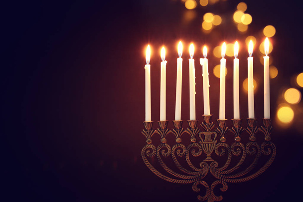 Religion image of jewish holiday Hanukkah background with menorah (traditional candelabra) and candles - Fotoğraf, Görsel