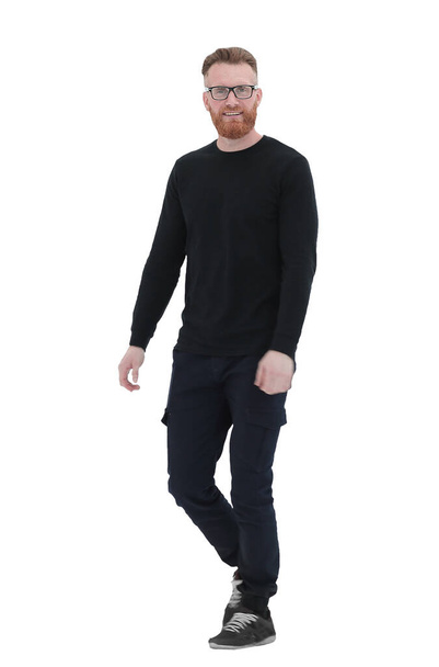 bearded man in a black sweater, stepping forward .isolated on white - Фото, зображення